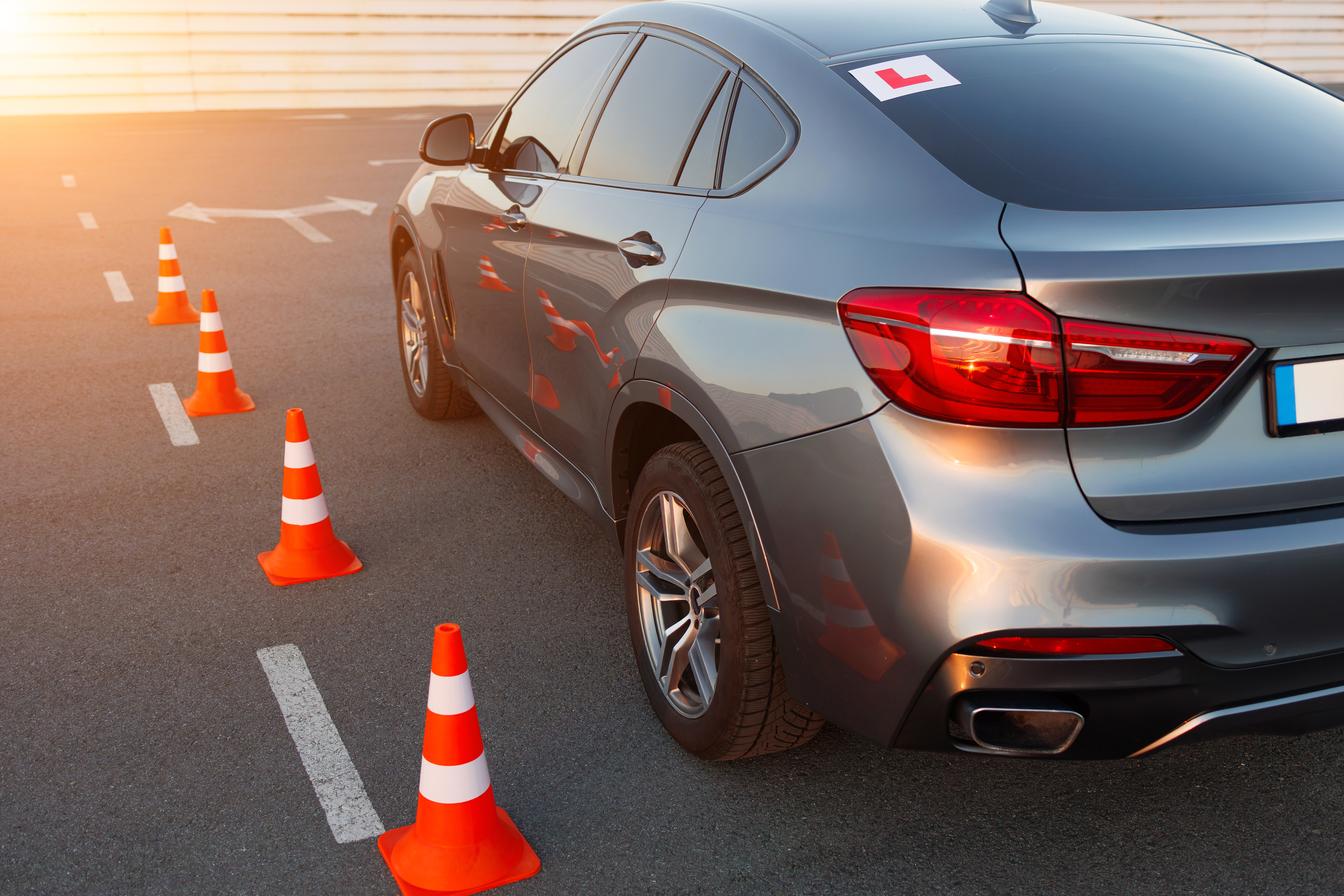 car maneuvering around orange traffic cones in par 2026 01 11 10 58 36 utc