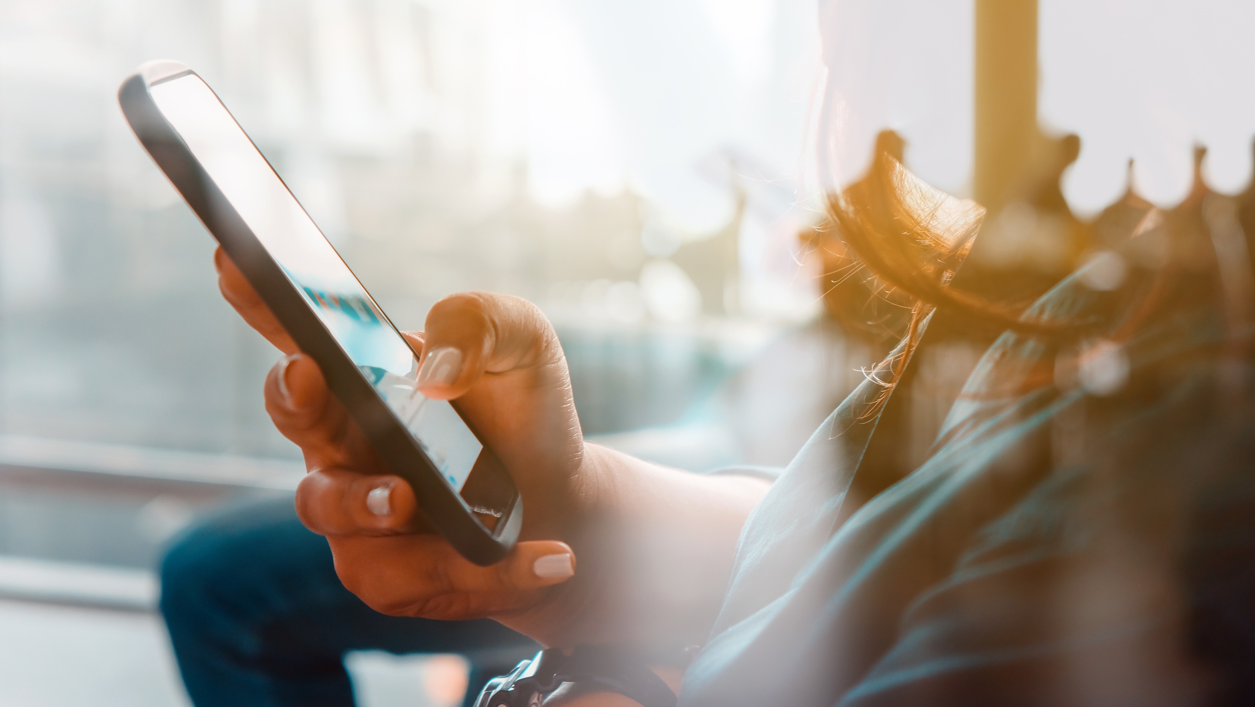 OrbitRemit vs Revolut: which is better for sending money from Australia close up on cellphone use indoors 2026 03 20 05 54 50 utc
