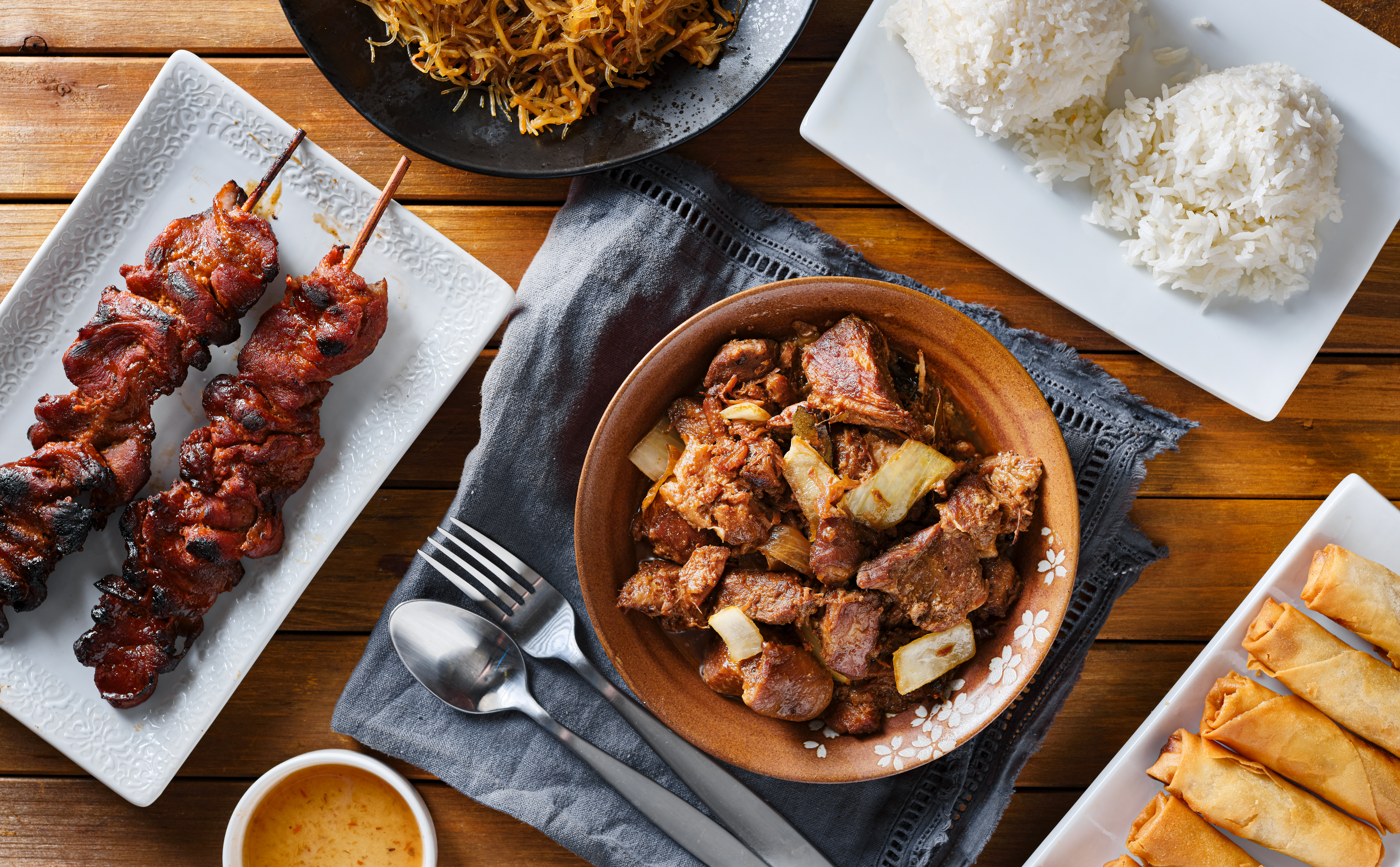 Filipino food culture in Australia: dishes, restaurants and the rise of Pinoy cuisine delicious food composition on wooden table 2026 01 09 08 38 51 utc