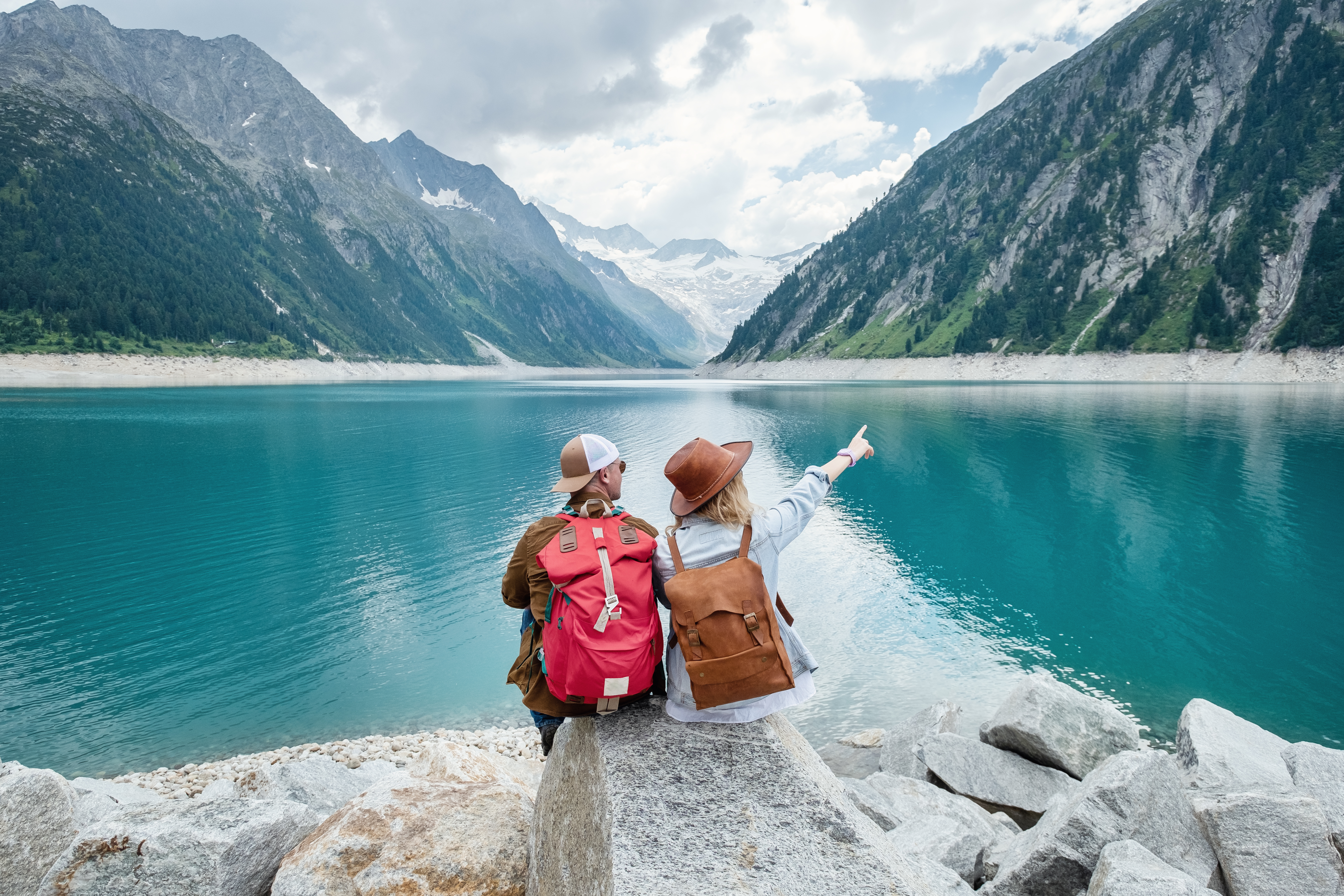 a team of travelers looking at the lake in austria 2026 03 23 23 00 30 utc