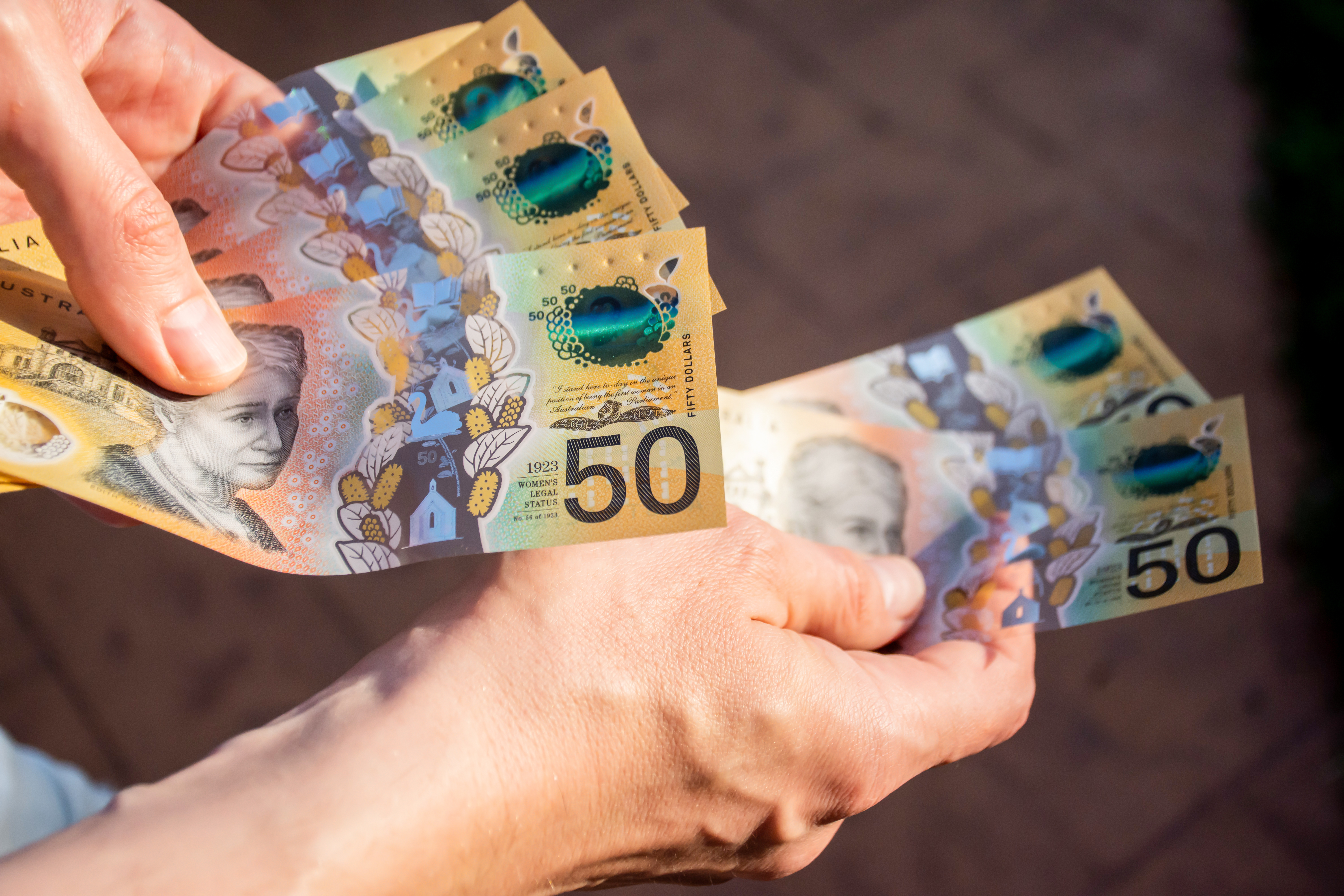 australian fifty dollar notes in hand 2026 03 16 23 52 19 utc