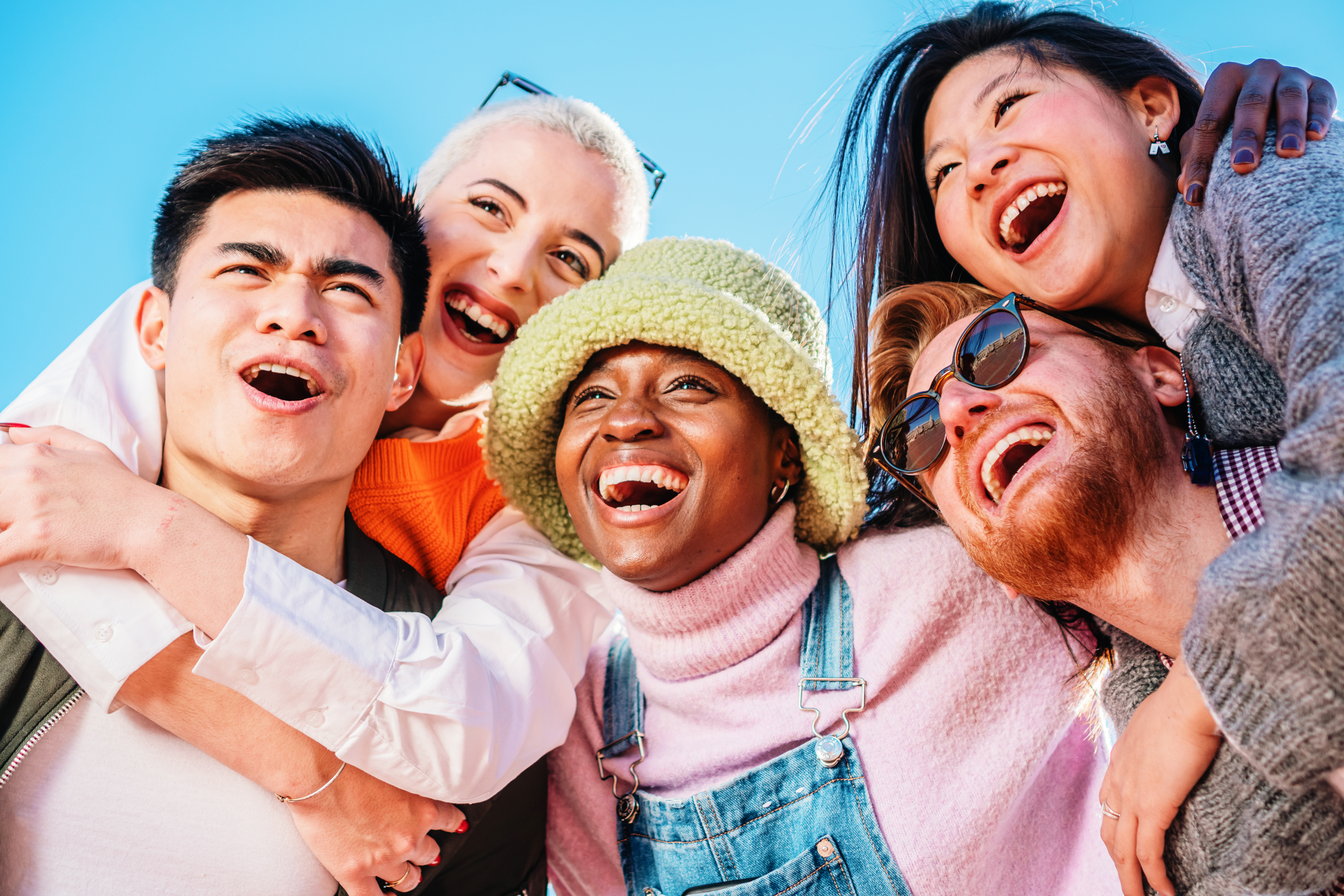 group of friends laughing together outdoors on sun 2026 01 08 07 19 55 utc