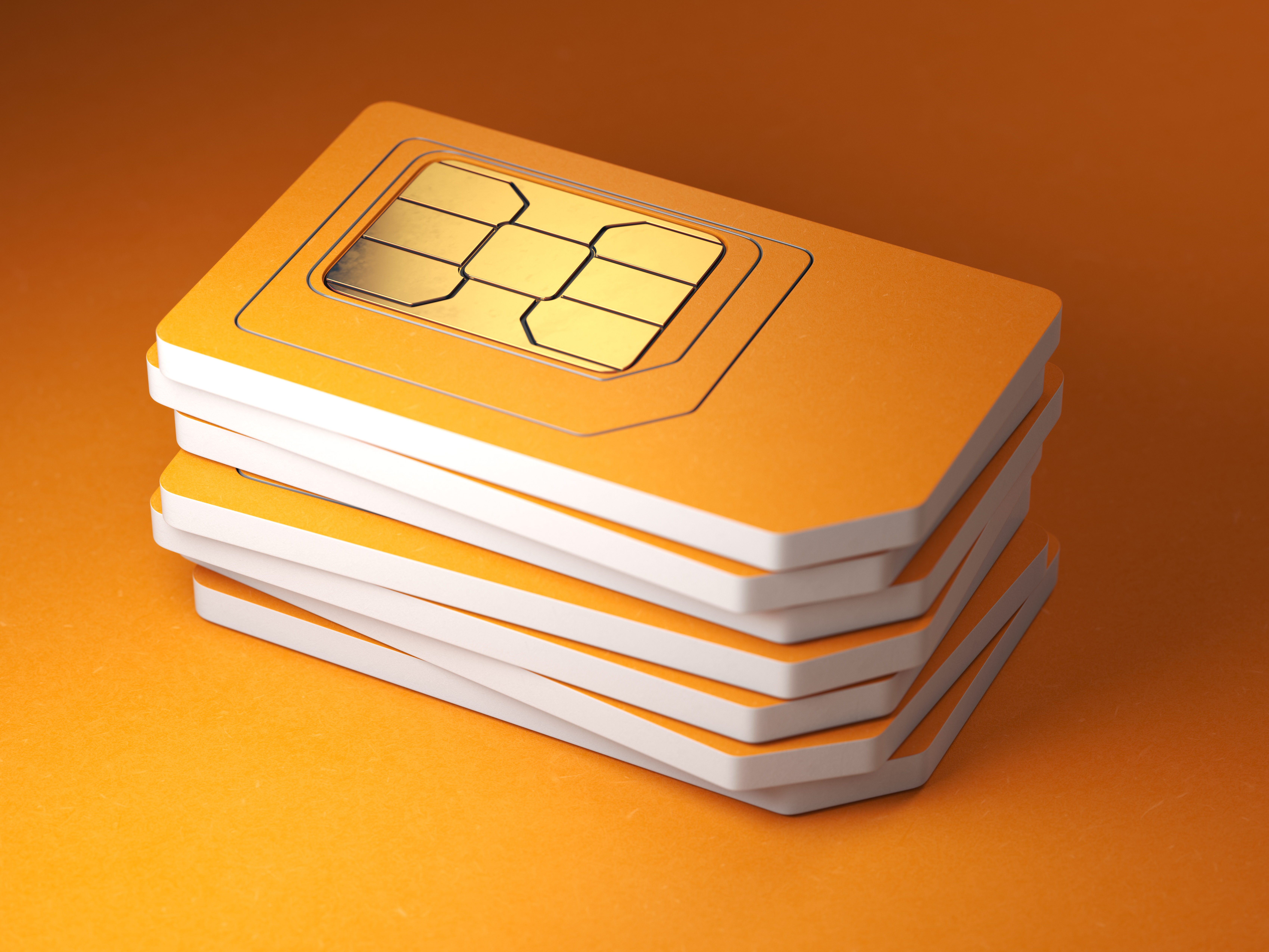 stack of sim cards on orange background 2026 03 19 23 42 21 utc