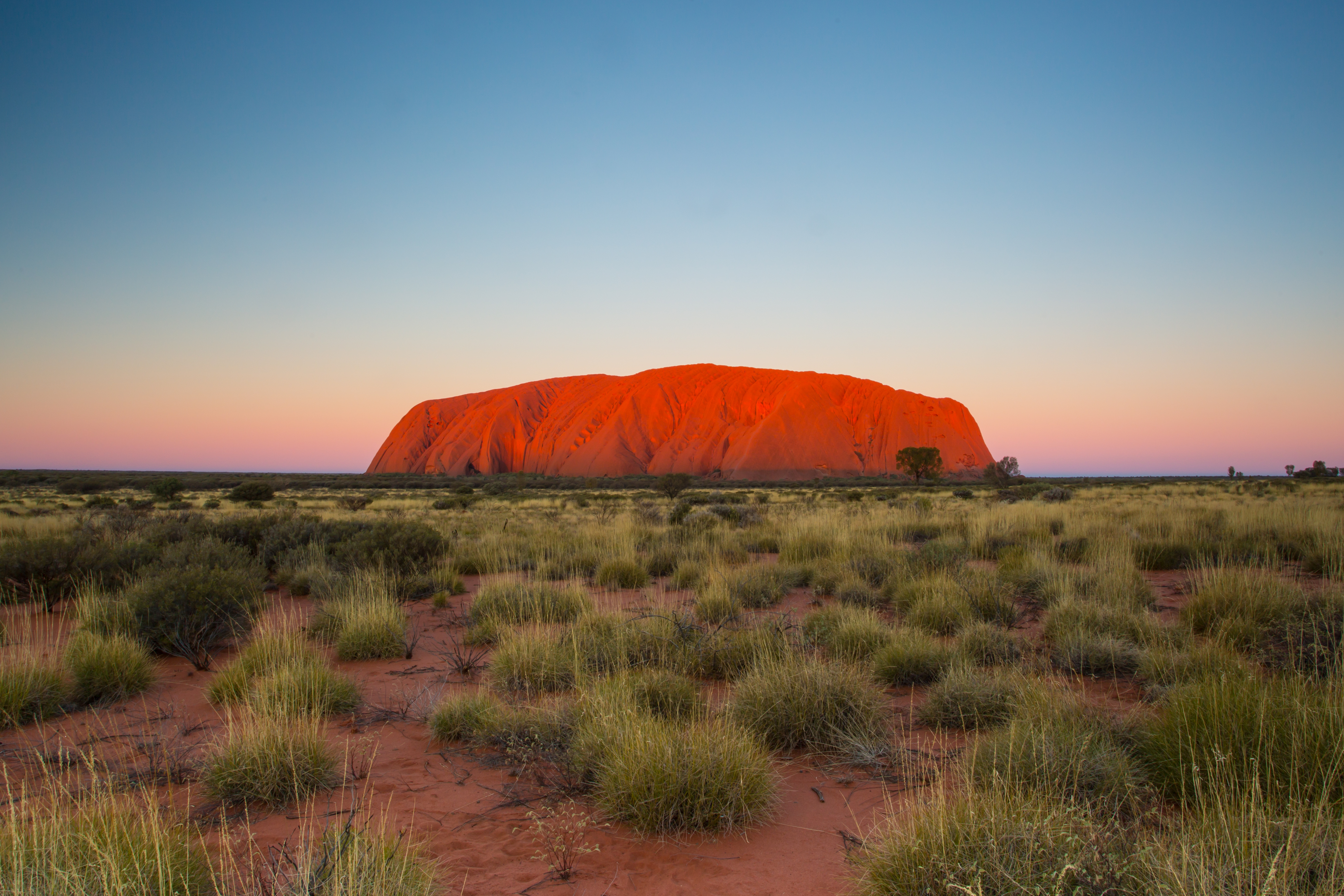 uluru rock formation at sunrise in australia 2026 03 19 23 58 52 utc