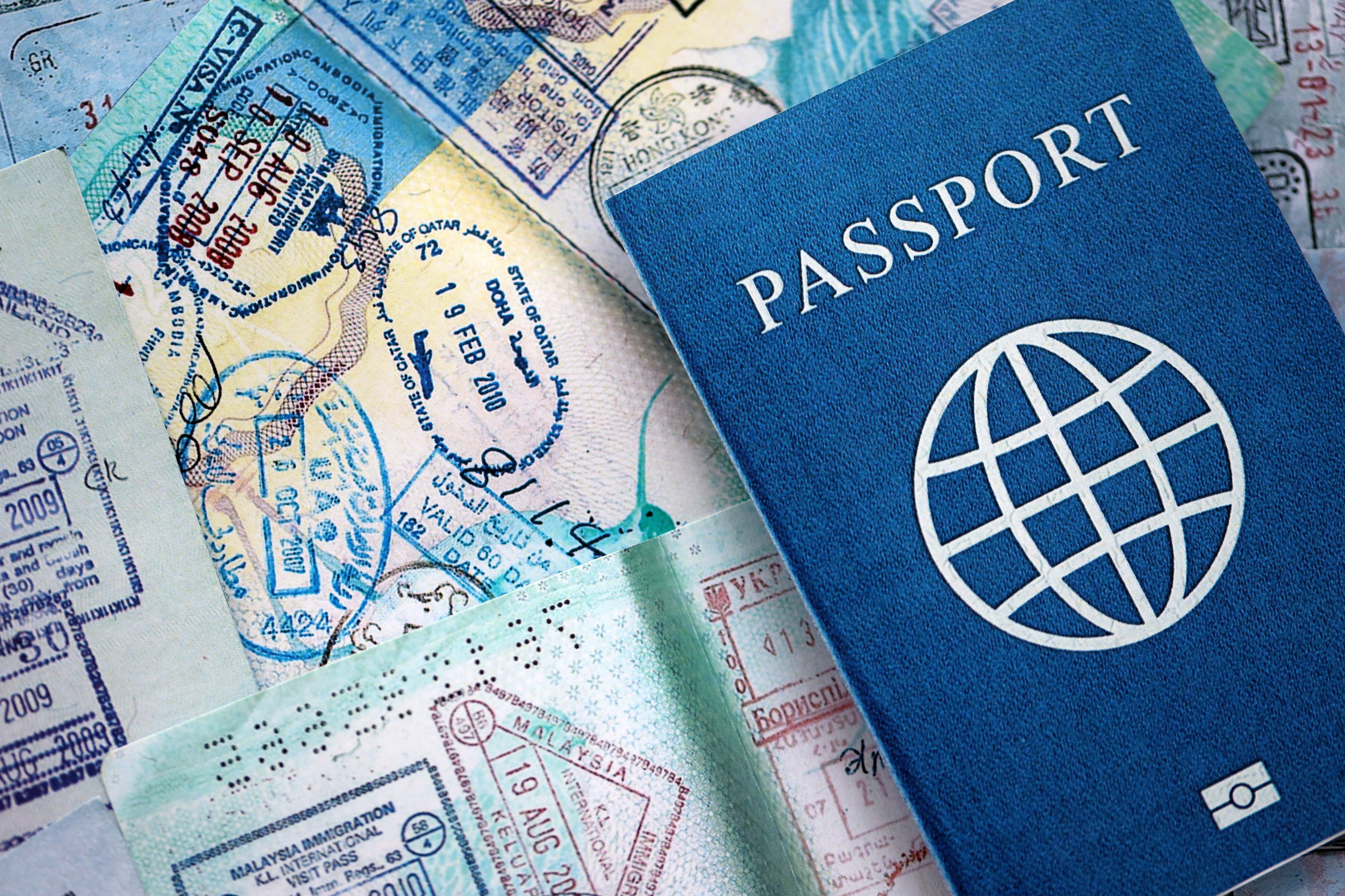 blue passport resting on a background of internati 2026 07 08 02 34 22 utc