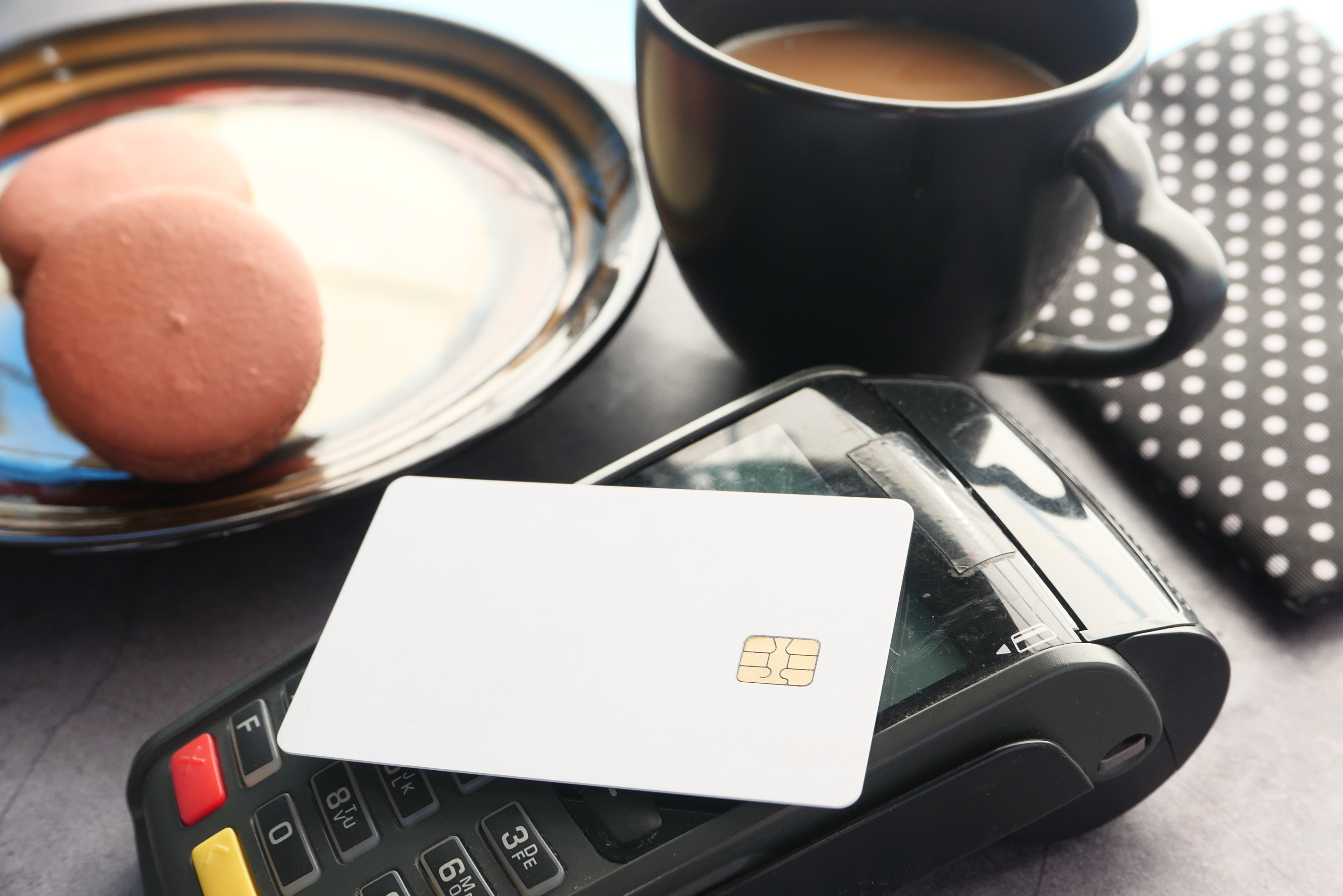 coffee and macarons with a credit card 2026 03 17 03 34 34 utc