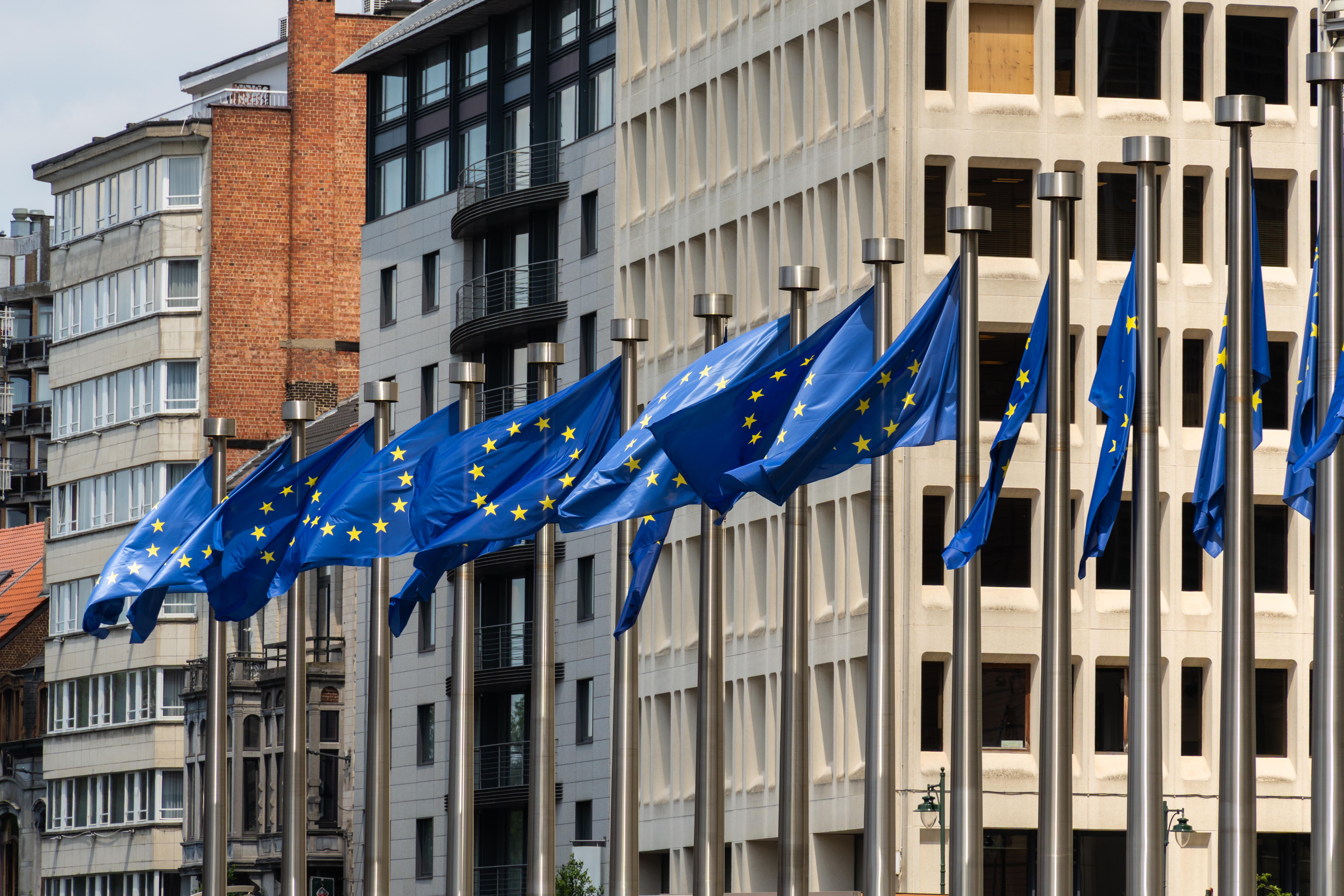 european union flags fluttering in urban setting 2026 03 26 23 24 35 utc