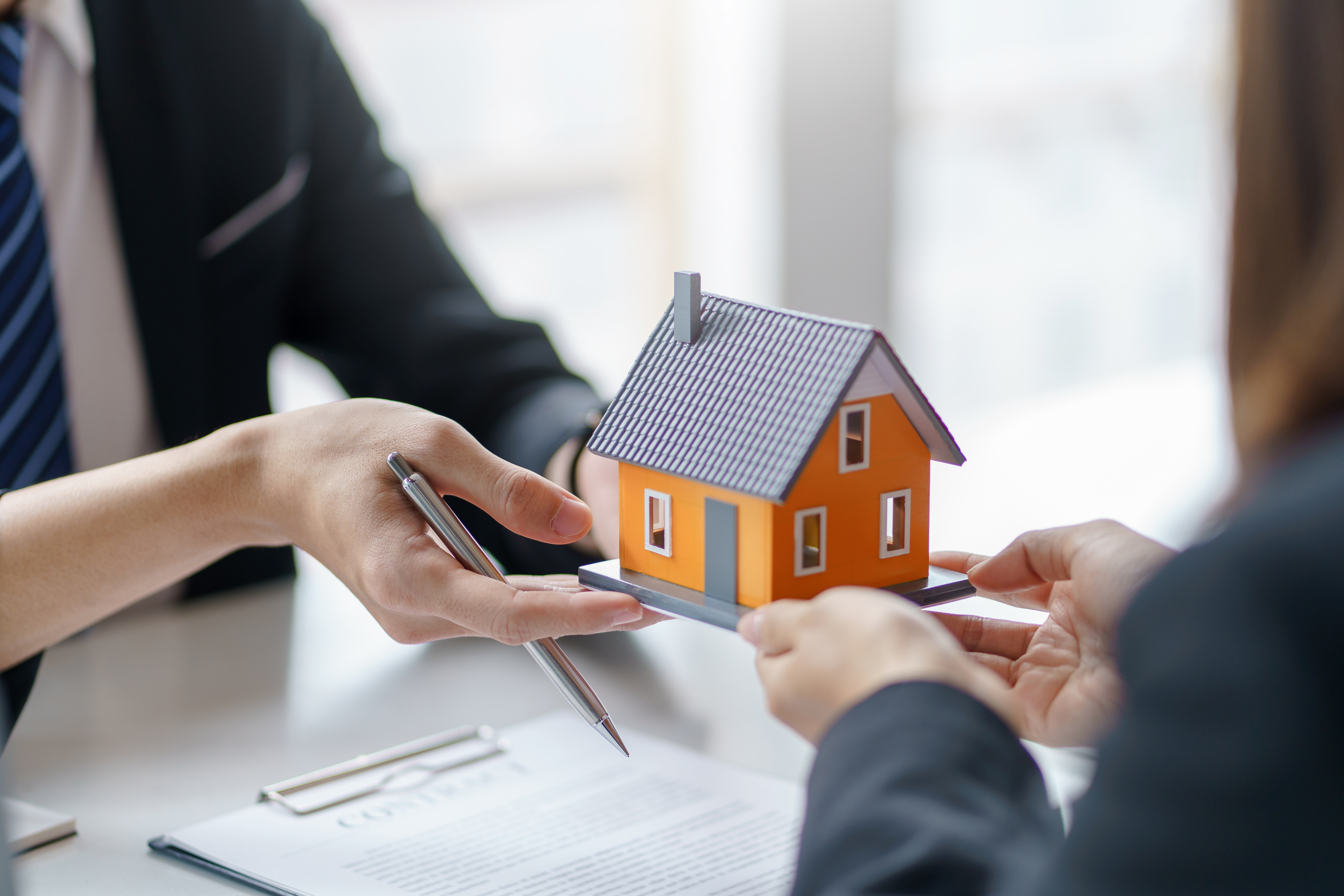What is LMI (Lenders Mortgage Insurance) in Australia? real estate agents discussing model home contract 2026 03 19 10 37 29 utc
